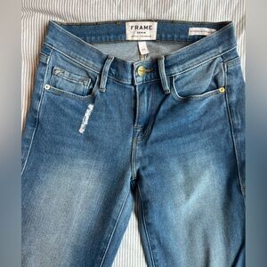 Frame Denim Light Blue Women's Skinny Jeans with Subtle Distress